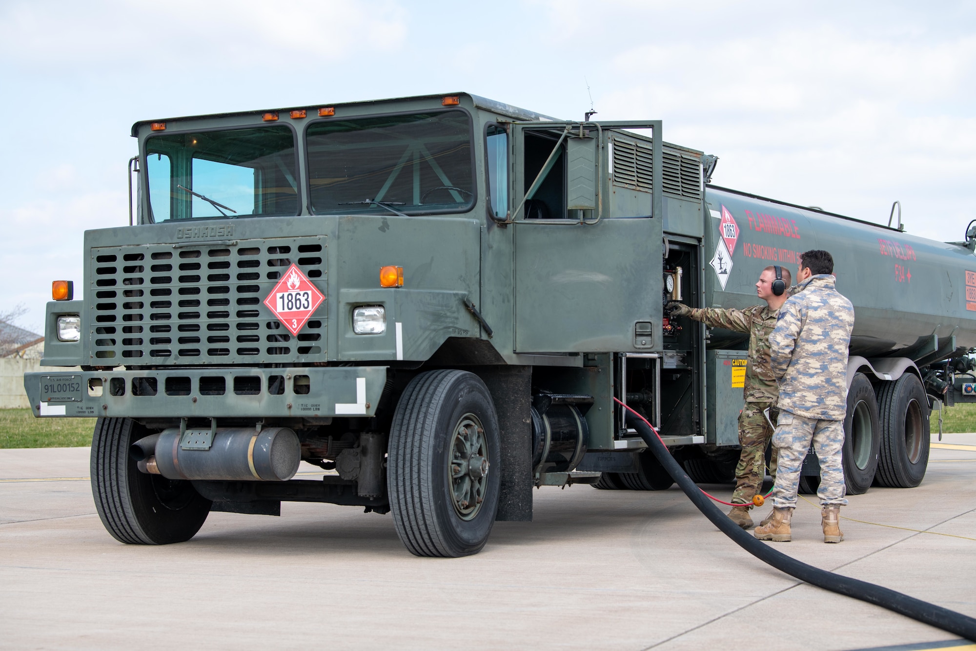 A R-11 fuel truck pumps fuel
