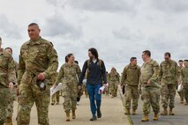 U.S. Air Force Airmen assigned to the 9th Reconnaissance Wing, are greeted by family members and Beale personnel as they return from a six-month deployment at Beale Air Force Base, California, April 7, 2025