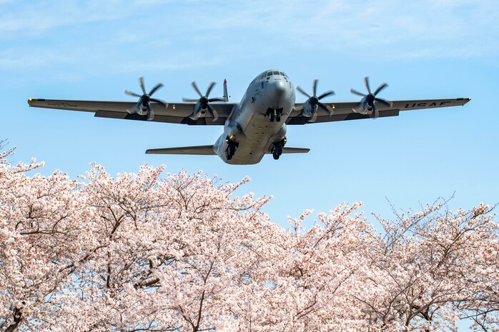 A U.S. Air Force C-130J Super Hercules aircraft assigned to the 36th Airlift Squadron flies over Yokota Air Base, Japan, during a training mission, April 8, 2025.