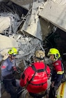U.S. Indo-Pacific Command military personnel work alongside Thai military and first responders near the collapsed State Audit Office building in Bangkok, which fell after a 7.7 magnitude earthquake affected Thailand and its neighboring countries on March 28, 2025.