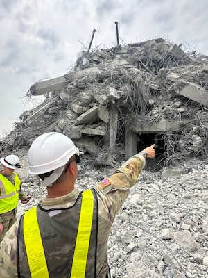 Members of a U.S. military Joint Engineer Response team assess damage and structural integrity after a 7.7 magnitude earthquake affected Thailand and its neighbor countries on March 28, 2025.
