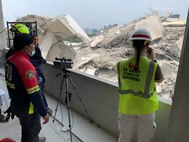 Members of a U.S. military Joint Engineer Response team and Thai counterparts assess damage and structural integrity after a 7.7 magnitude earthquake affected Thailand and its neighbor countries on March 28, 2025.