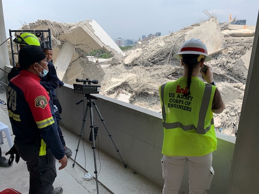 Members of a U.S. military Joint Engineer Response team and Thai counterparts assess damage and structural integrity after a 7.7 magnitude earthquake affected Thailand and its neighbor countries on March 28, 2025.