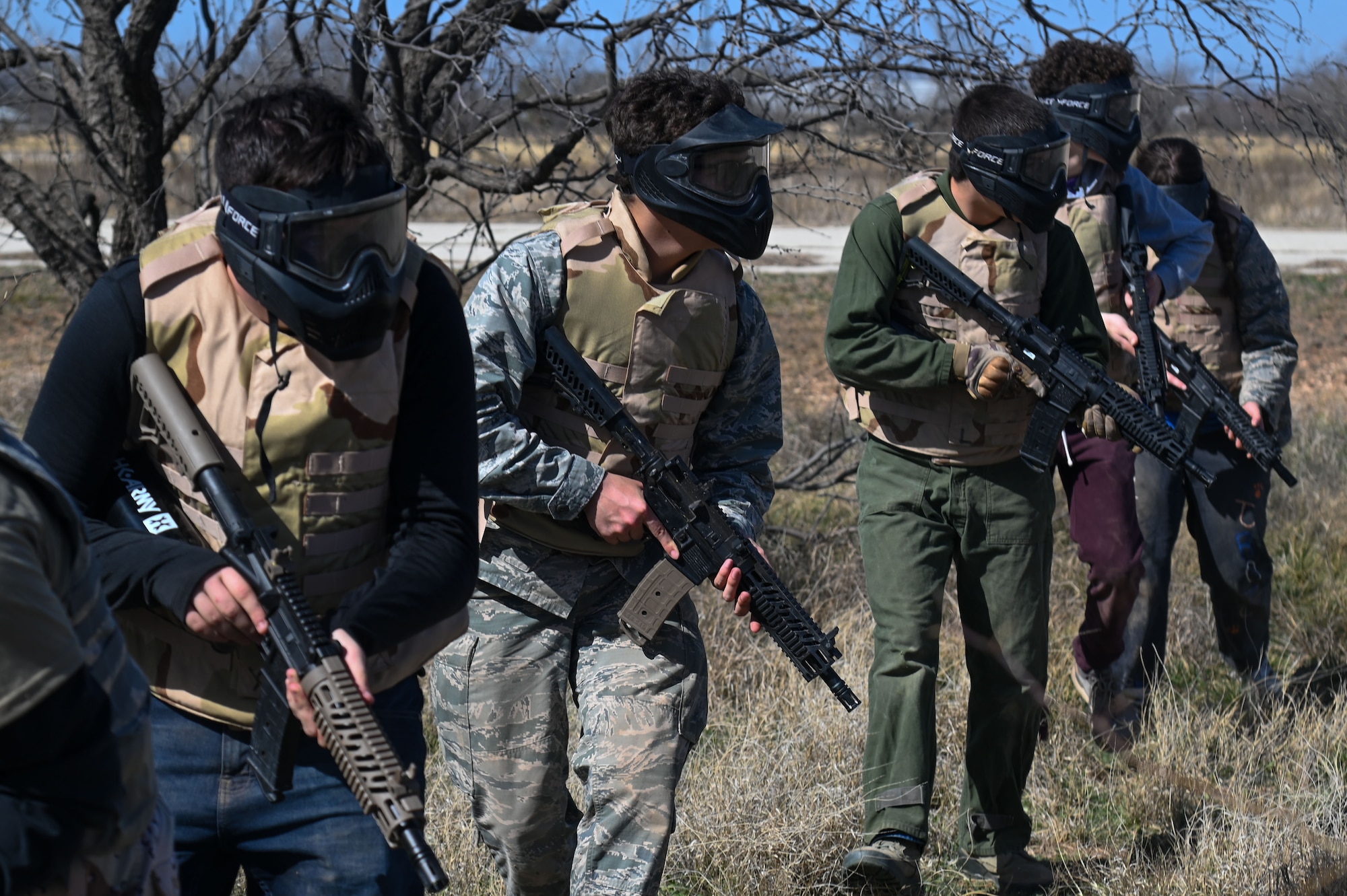 Central High School Air Force Junior ROTC participated in a simulated firefight during their field training exercise at Goodfellow Air Force Base, Texas, March 7, 2025. JROTC is a high school elective with an Air Force structure combining aspects of a military organization with classroom instruction, hands-on leadership training and responsibilities, plus opportunities for extracurricular team and community service participation. (U.S. Air Force photo by Airman 1st Class James Salellas)