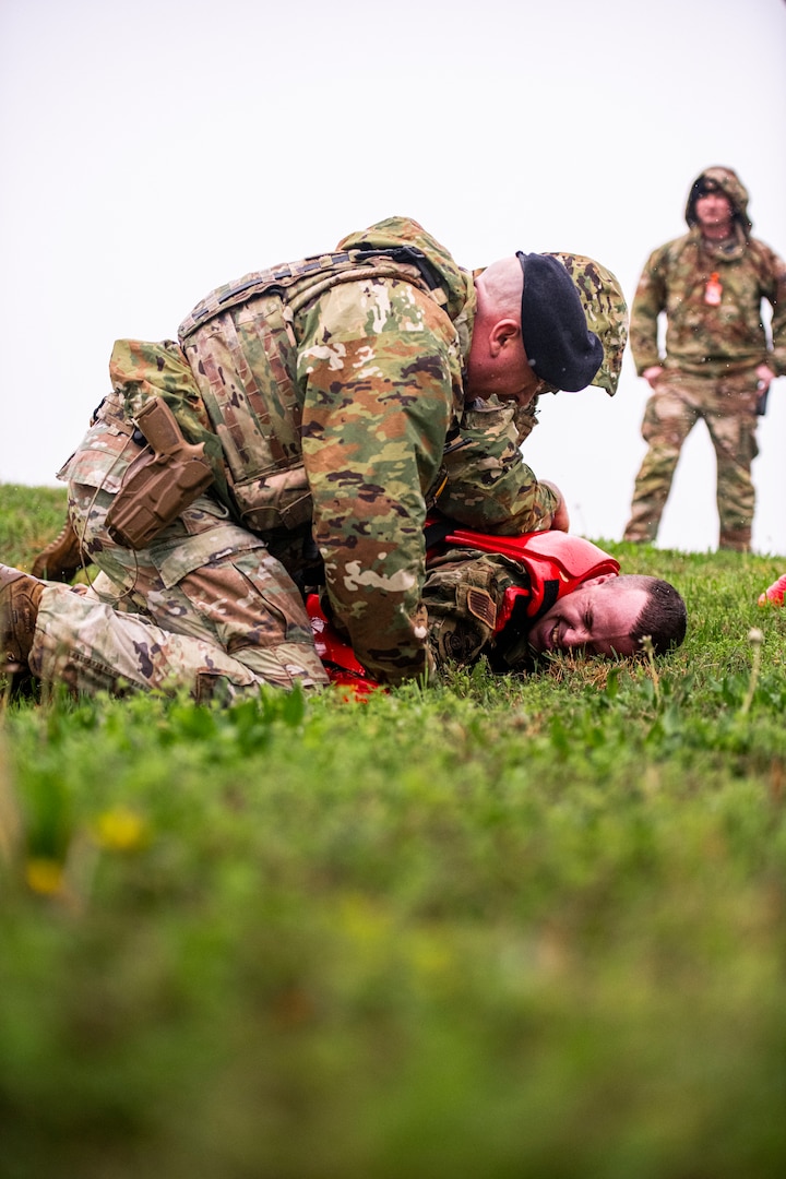 U.S. Air National Guard Master Sgt. Bryan Wright from the 134th Security Forces Squadron instructs a suspect during a perimeter breach exercise on McGhee Tyson Air National Guard Base, Tennessee on April 6, 2025.