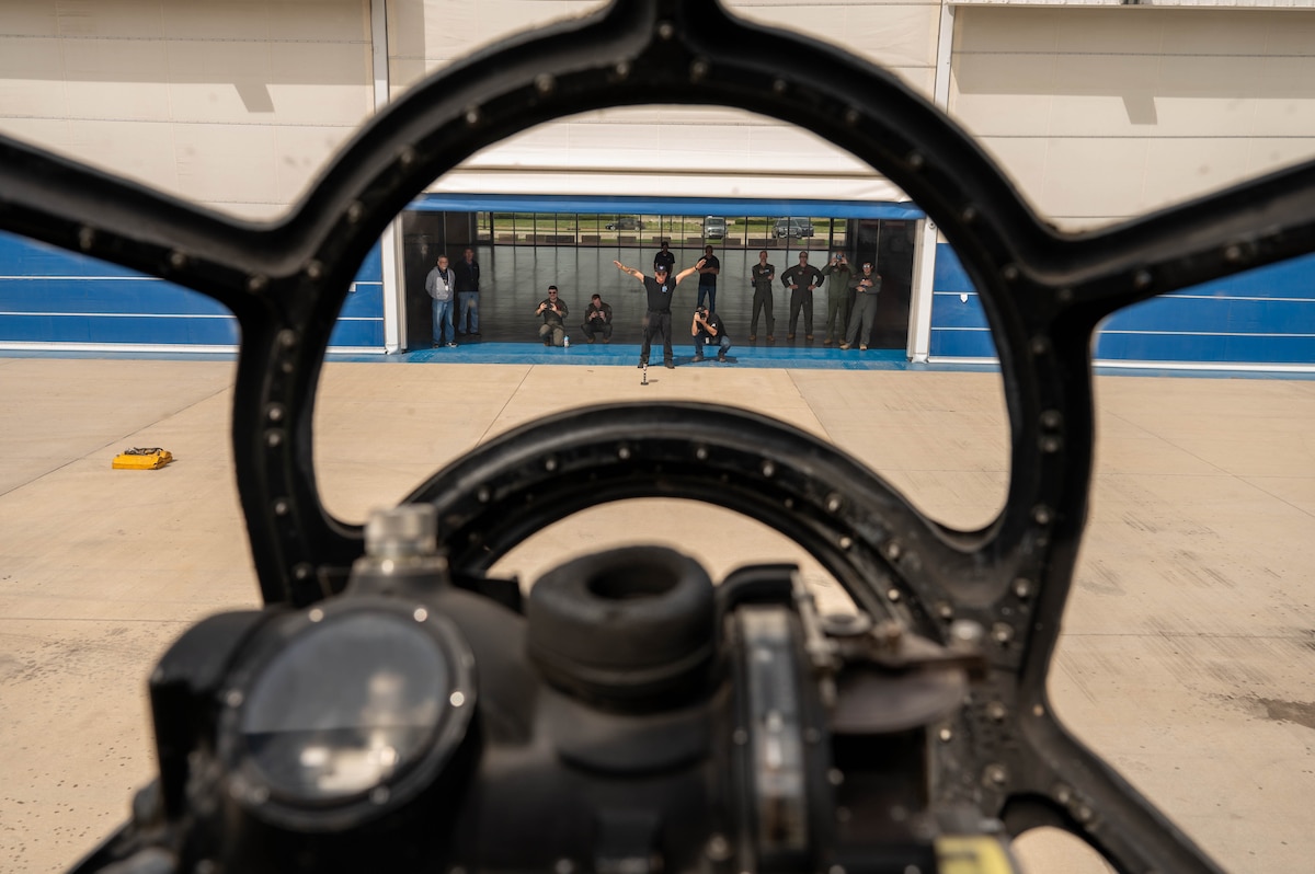‘Doc’s Friends’, maintainers for the B-29 Superfortress ‘Doc’, wave the aircraft up to a hangar in Wichita, Kansas, April 2, 2025. Volunteers from the 97th Maintenance Squadron have assisted in Doc’s restoration and upkeep for more than a decade. (U.S. Air Force photo by Senior Airman Kari Degraffenreed)