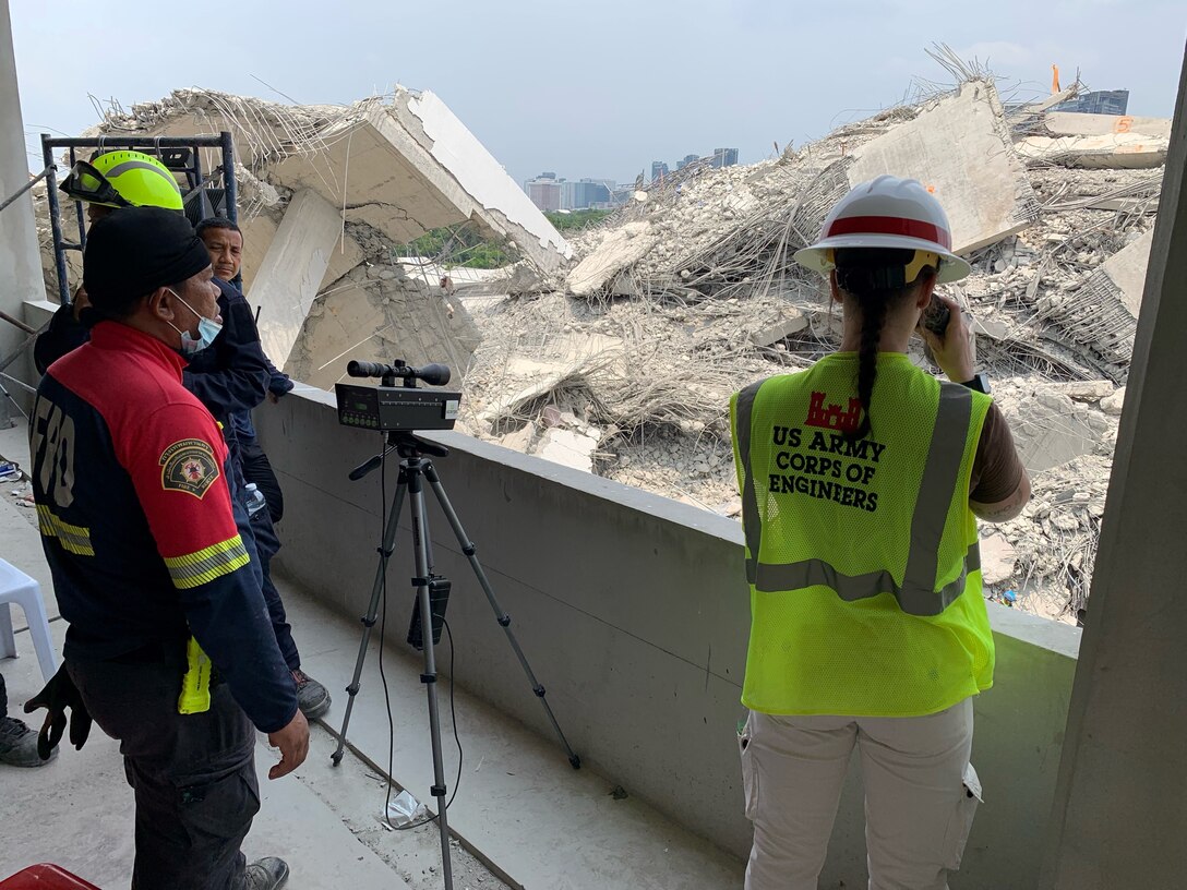 Members of a U.S. military Joint Engineer Response team and Thai counterparts assess damage and structural integrity after a 7.7 magnitude earthquake affected Thailand and its neighbor countries on March 28, 2025.