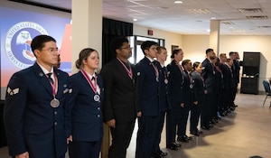 Graduates from Airman Leadership School Class 25-C stand in formation during their graduation ceremony at Laughlin Air Force Base, Texas, April 3, 2025. The class, hosted by Goodfellow AFB instructors, marked the return of ALS to Laughlin after more than a decade. (U.S. Air Force photo by Airman 1st Class Harrison Sullivan)