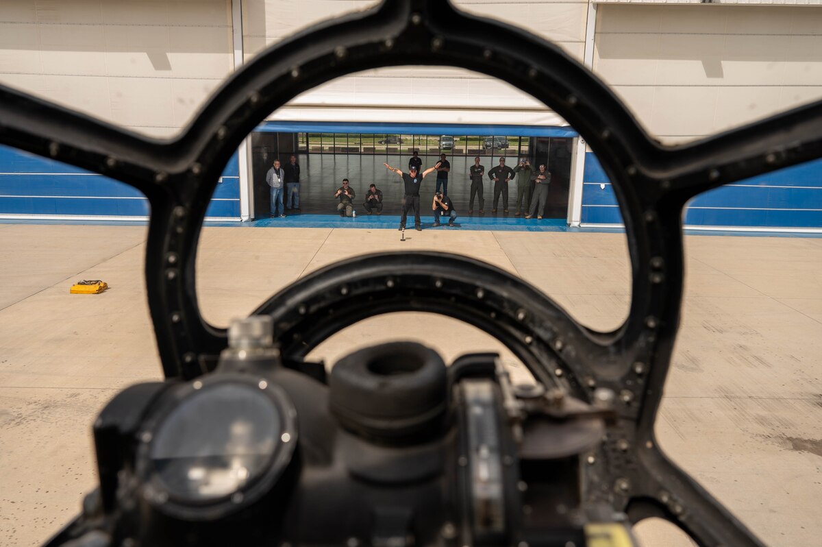 ‘Doc’s Friends’, maintainers for the B-29 Superfortress ‘Doc’, wave the aircraft up to a hangar in Wichita, Kansas, April 2, 2025. Volunteers from the 97th Maintenance Squadron have assisted in Doc’s restoration and upkeep for more than a decade. (U.S. Air Force photo by Senior Airman Kari Degraffenreed)