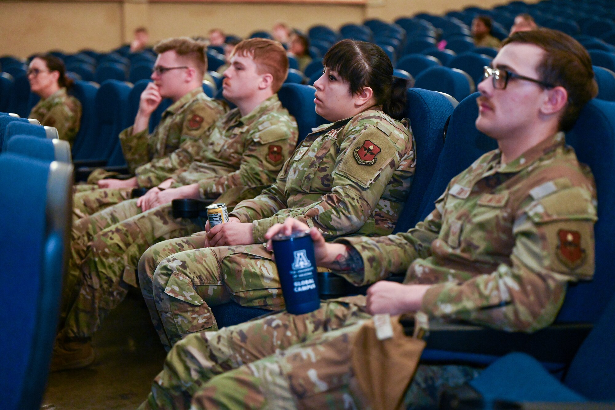 Airmen from the 97th Air Mobility Wing listen to a severe weather briefing at Altus Air Force Base, Oklahoma, March 20, 2025. The briefing emphasized readiness for residents living in tornado alley. (U.S. Air Force photo by Airman 1st Class Nathan Langston)