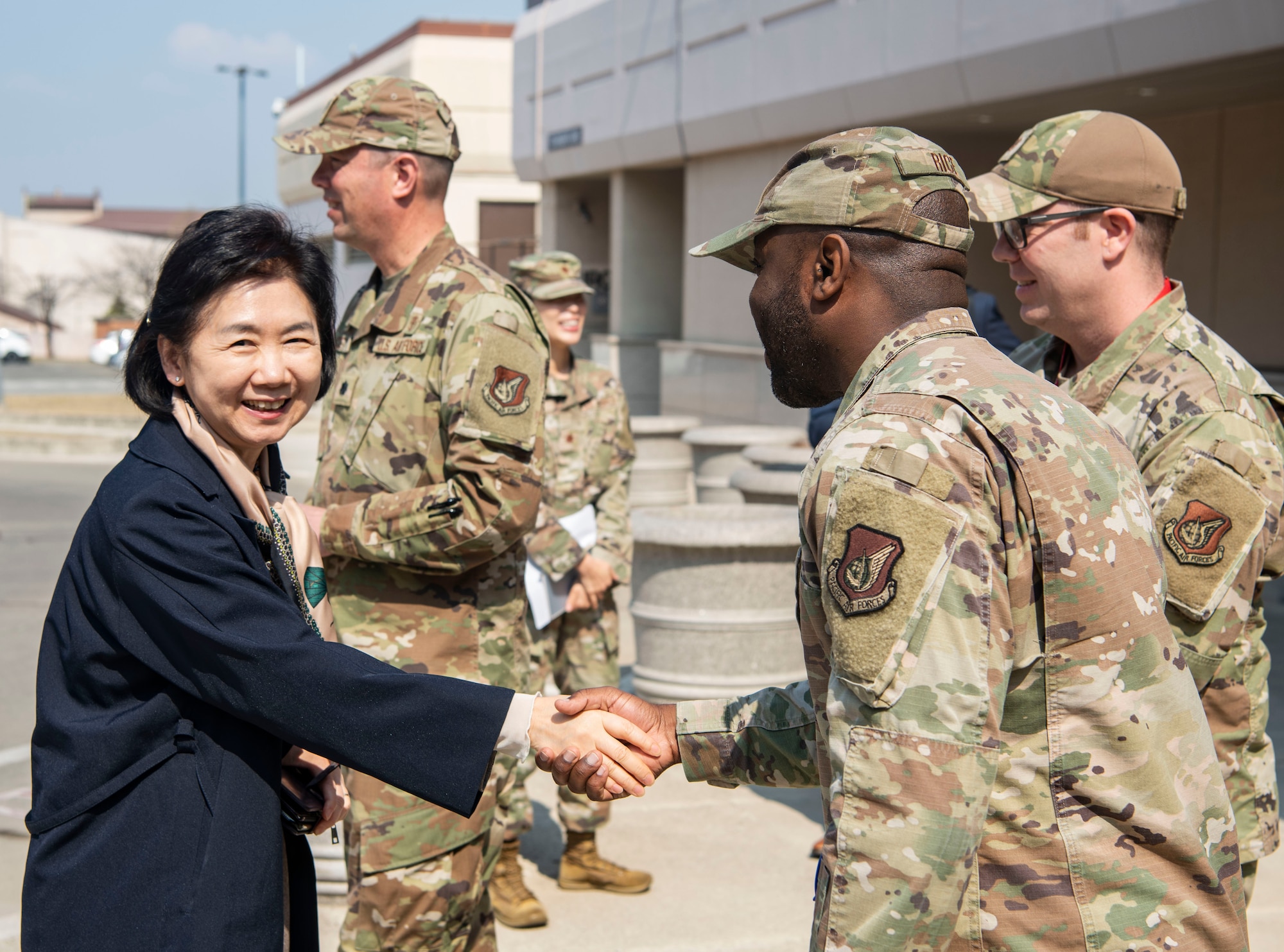 Dr. Young Mee Jee, Korea Disease Control Agency commissioner, left, meets members of the 51st Medical Group at Osan Air Base, Republic of Korea, April 3, 2025.