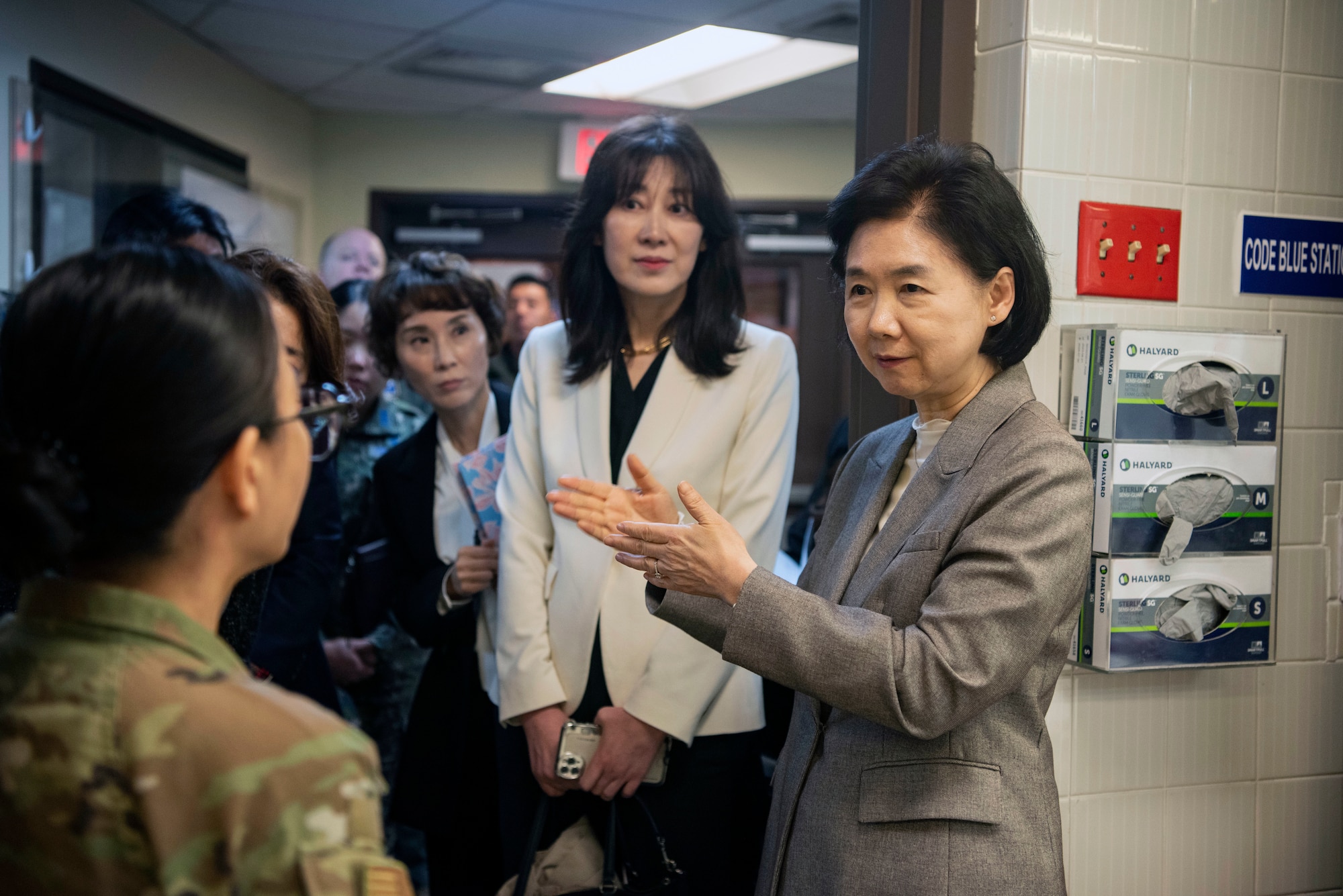 Dr. Young Mee Jee, Korea Disease Control Agency commissioner, right, asks a question to a member of the 51st Medical Group at Osan Air Base, Republic of Korea, April 3, 2025.