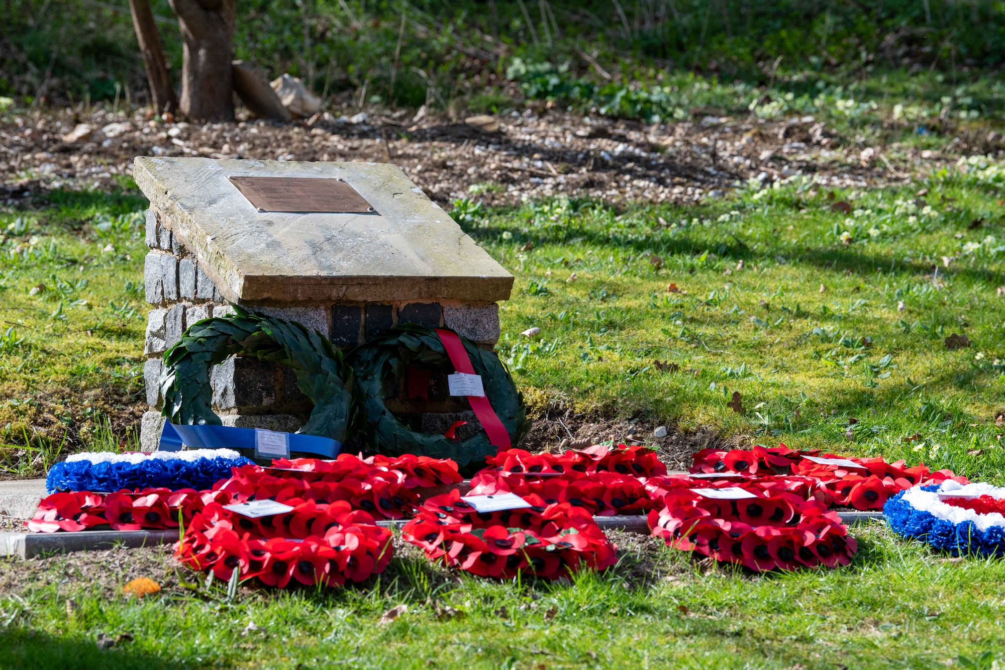 Wreaths rest at the base of the Lancaster crew’s permanent memorial