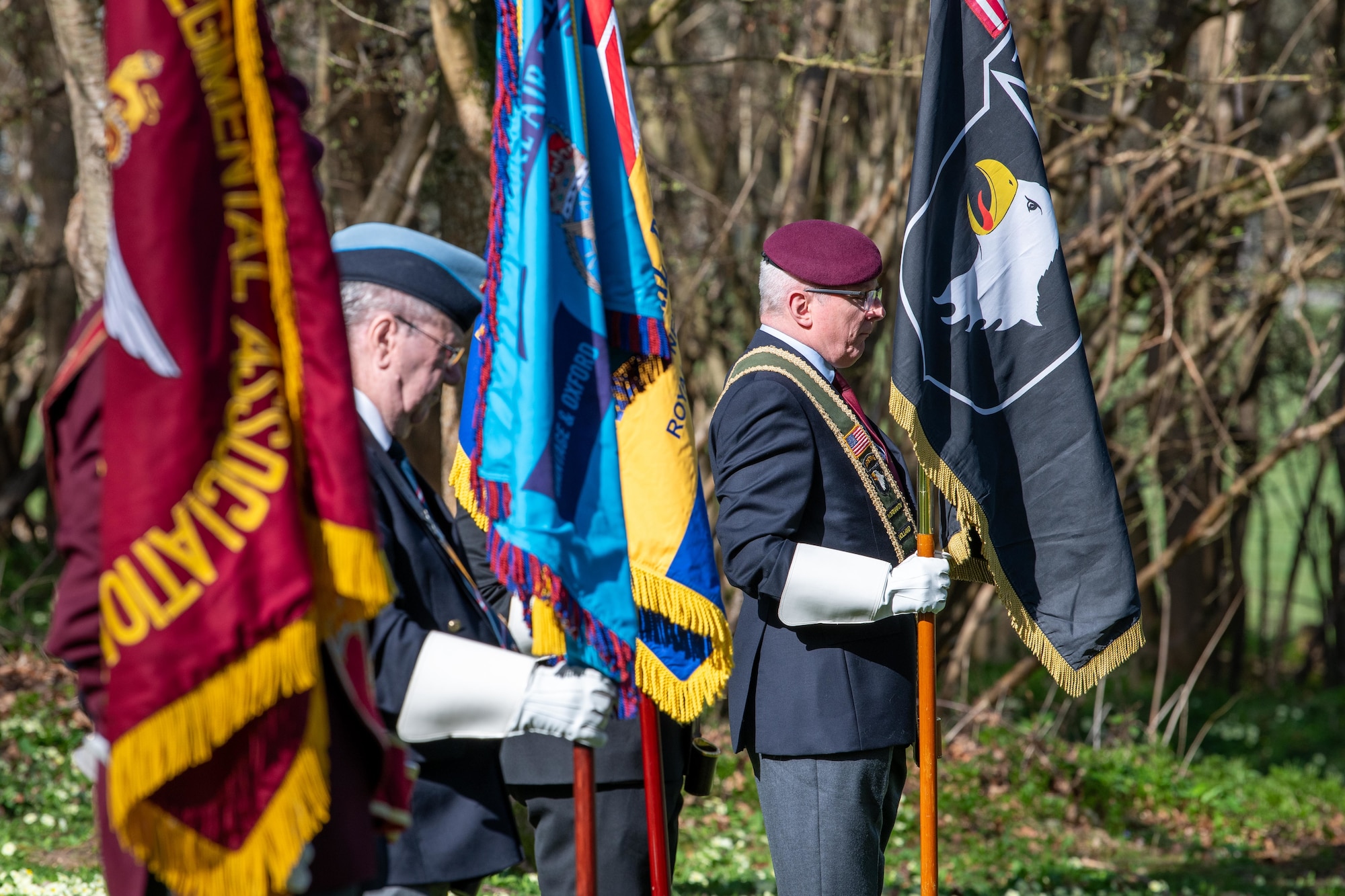 Members of the West Berkshire and Oxford Parachute Regimental Association stand during a memorial service