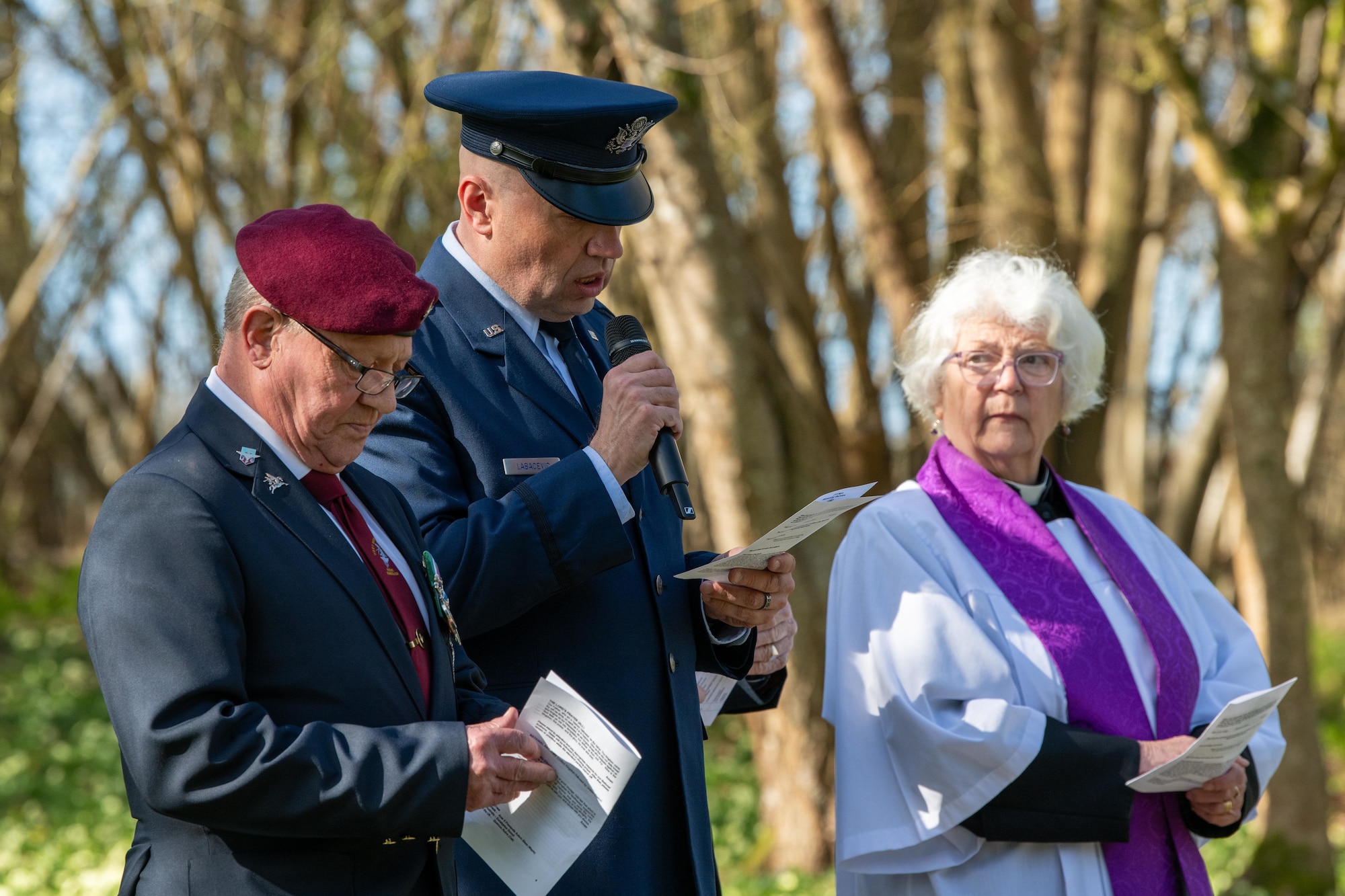 U.S. Air Force chaplain delivers a prayer during a memorial service