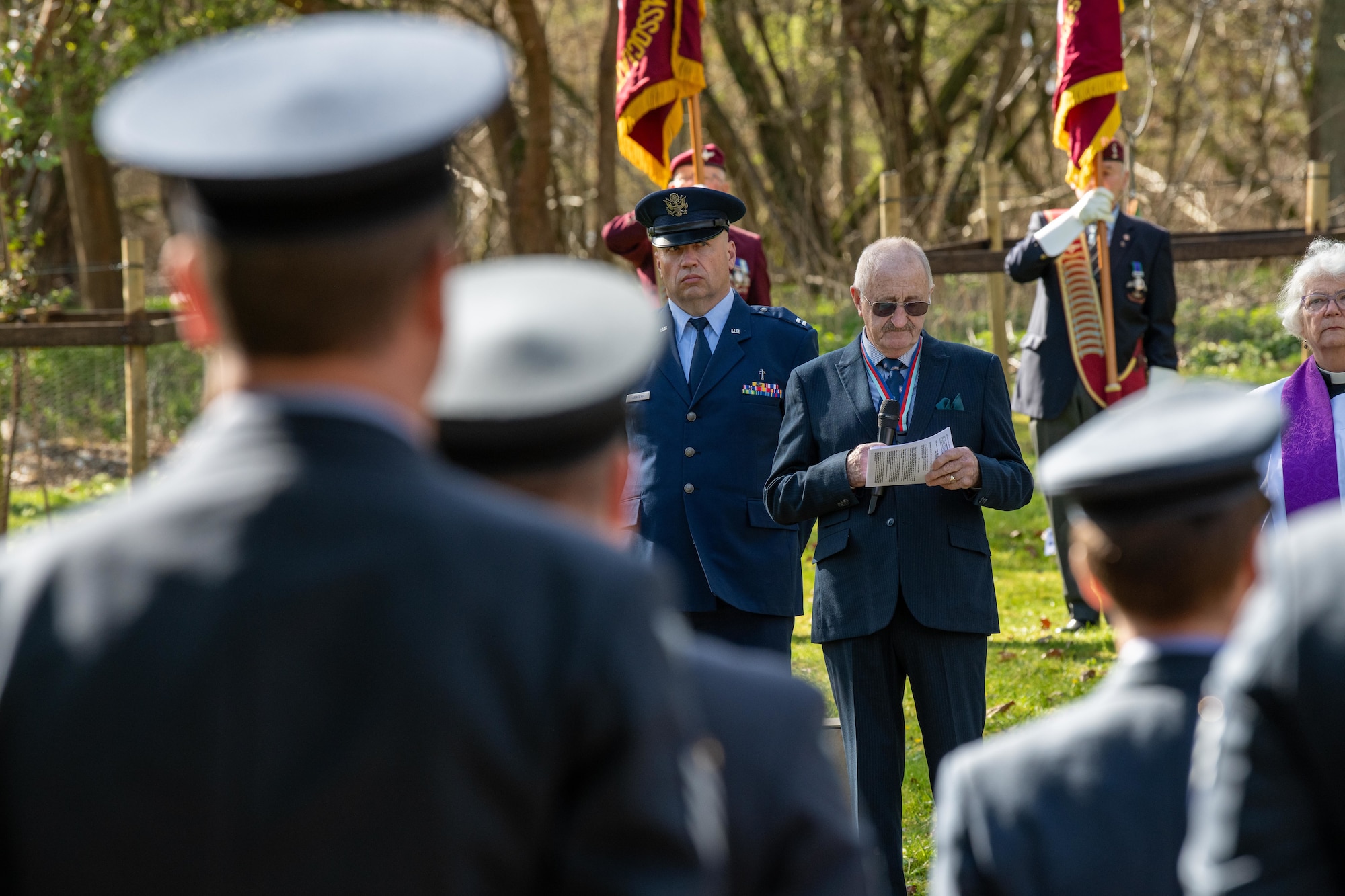 Speaker gives remarks during a memorial service