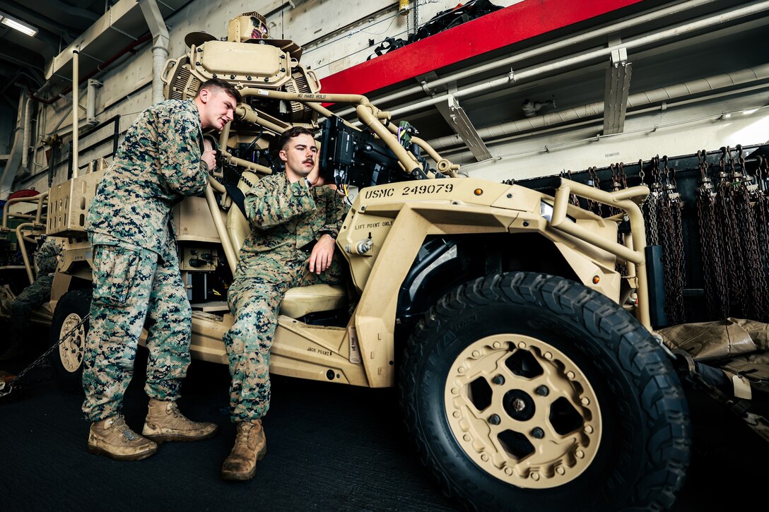 U.S. Marine Corps Cpl. Calix Wheaton, left, an air defense systems technician, and Sgt. Caiden Pate, a low altitude air defense gunner, both with Marine Medium Tiltrotor Squadron 263 (Reinforced), 22nd Marine Expeditionary Unit, operate a Light-Marine Air Defense Integrated System during Amphibious Squadron 8 (PHIBRON 8), 22nd MEU Integration (PMINT) exercise, aboard the San Antonio-class amphibious transport dock ship USS San Antonio (LPD 17), Iwo Jima Amphibious Readiness Group (ARG), while underway in the Atlantic Ocean, April 5, 2025. PMINT is the 22nd MEU’s first opportunity in their pre-deployment training program to fully integrate with PHIBRON 8 while at sea, allowing Marines and Sailors to train together as an ARG/MEU team across various functional areas in preparation for their upcoming deployment. (U.S. Marine Corps photo by Cpl. Maurion Moore)