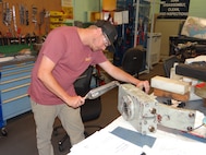 Norfolk Naval Shipyard (NNSY) Shop 31 recently tested the pilot of the model line initiative with their auxiliary ballast tanks, utilizing principles from Dr. Steven Spear and learnings from Portsmouth Naval Shipyard (PNSY) to complete repairs that had previously taken approximately 150 days to now 35 days. This initiative was a huge win for the shipyard and was thanks to the teamwork from Shop 31, Code 100TO and the engineering department to ensure pre-planning and material acquisition was handled prior to the start of the job to ensure the mechanics could conduct non-stop execution of work.