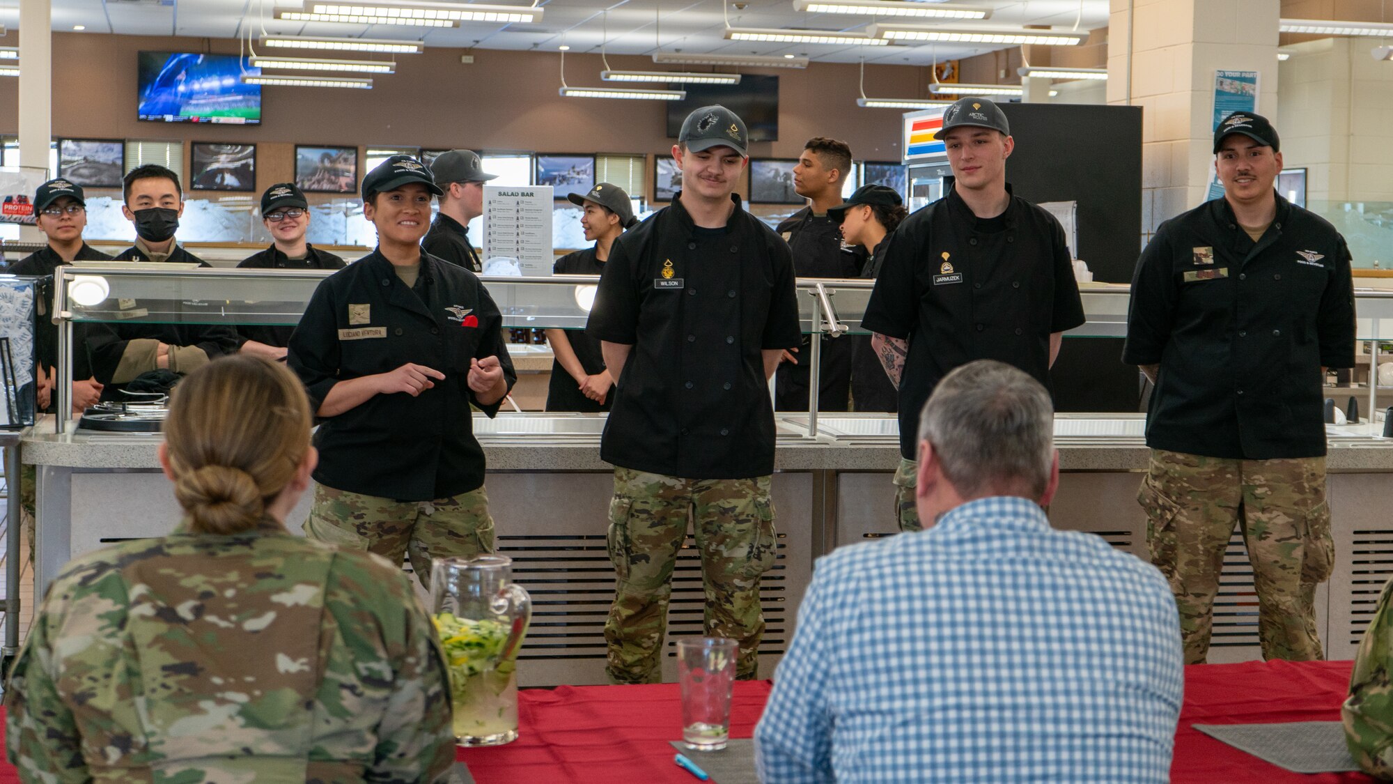 U.S. Army 1st Infantry Brigade Combat Team, 11th Airborne Division Soldiers brief their recipes for the judges during a cooking competition at the Wolves Den Warrior Restaurant on Fort Wainwright, Alaska, March 27, 2025.