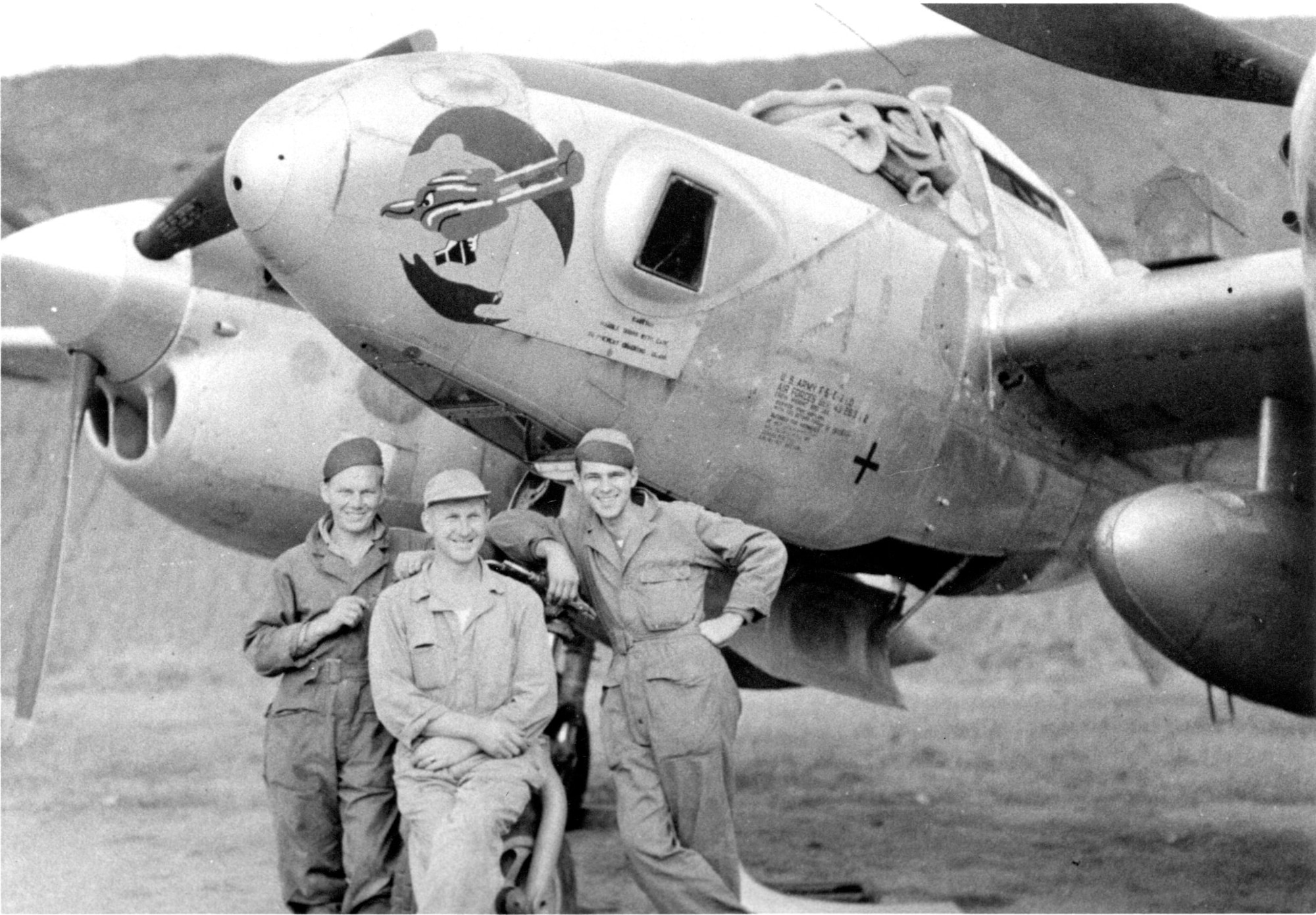 Capt Edward B. “Shifty” Burdett of the 35th Photo Reconnaissance Squadron is seen here with two members of his ground crew by their Lockheed F-5E Photo Lightning reconnaissance plane in China, circa 1944-1945.  (142nd Wing History Archive)