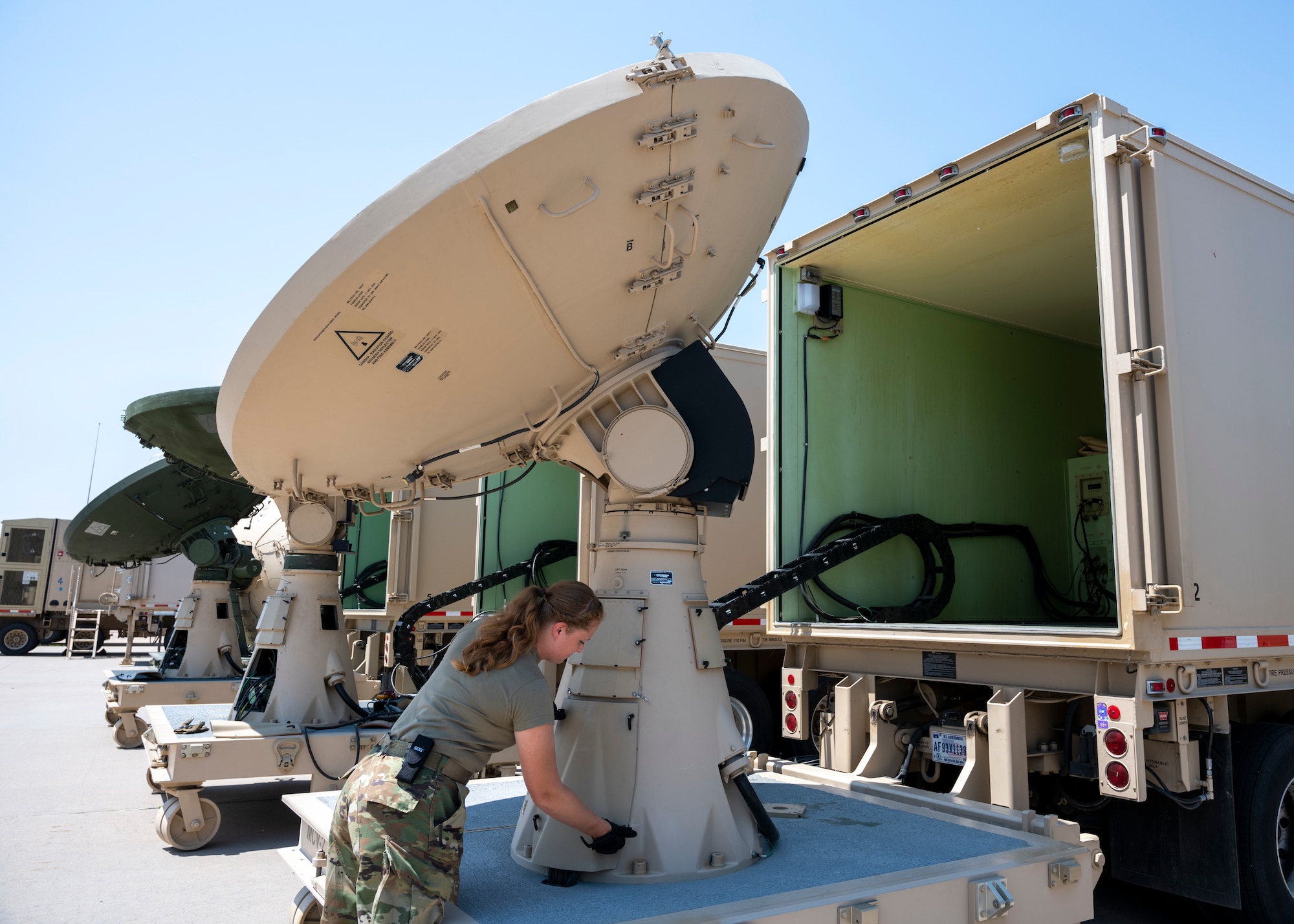 U.S. Air Force Staff Sgt. Rhyan Acey performs maintenance on the AN-TSQ-180 Milstar Communications Vehicle July 28, 2021 at the 233rd Space Group, Greeley Air National Guard Station, Greeley, Colorado. GANGS was the first National Guard unit to assume an Air Force Space Command mission.