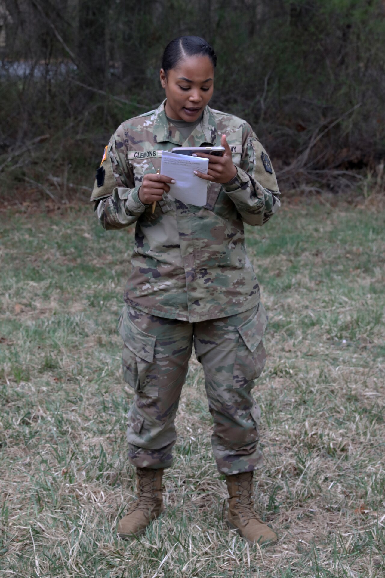 U.S. Army Capt. Angela Clemons, a public affairs officer with the 109th Mobile Public Affairs Detachment, 213th Regional Support Group, conducts a briefing during a field training exercise at Fort Indiantown Gap, Pennsylvania, April 4, 2024. These Soldiers executed this training to improve the unit's readiness for future missions. (U.S. Army National Guard photo by Spc. Skylin Simpson)