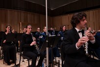 Students play flute and clarinet alongside the U.S. Air Force Band.