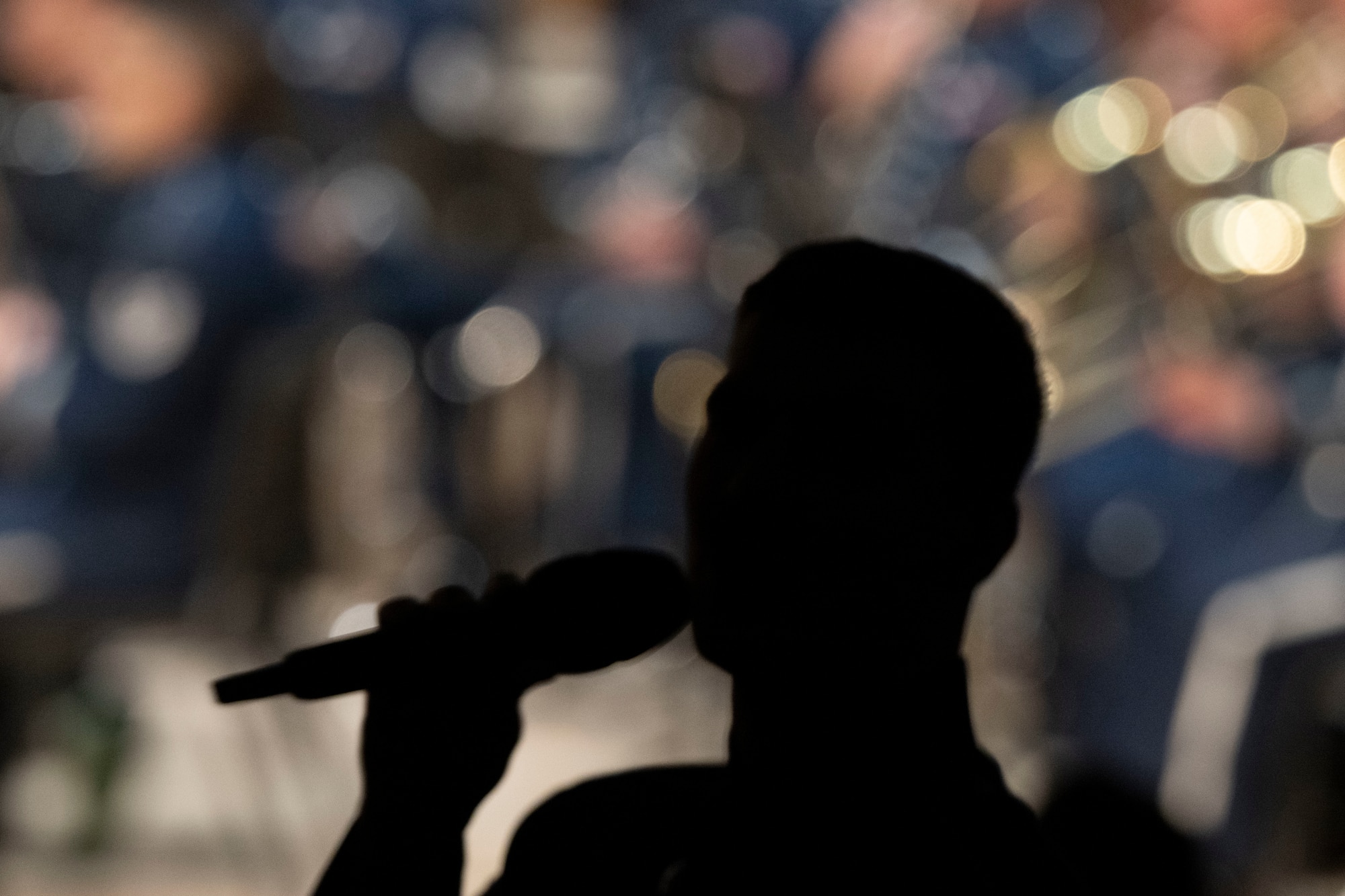 U.S. Air Force Tech. Sgt. Ben Edquist, vocalist with the U.S. Air Force Band, performs at the Newel and Jean Daines Concert Hall in Logan, Utah, March 25, 2025.