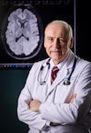 Dr. David Williamson, director of the Inpatient Neuropsychiatric and Traumatic Brain Injury ward and Brain Injury Medicine at Walter Reed National Military Medical Center, poses for a photo in Bethesda, Md., on April 8, 2025. Dr. Williamson will lead the new Rapid Assessment Program for Tactical Operational Readiness (RAPTOR), a multidisciplinary initiative providing expedited and comprehensive evaluations to support special operations active-duty service members' rapid return to duty. (DOD photo by Ricardo J. Reyes)