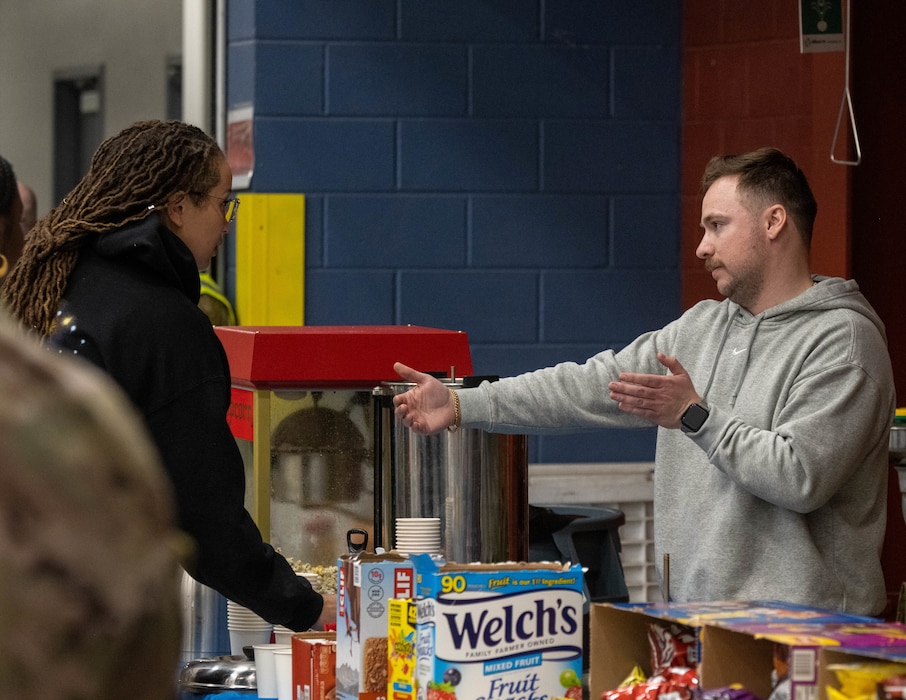 Members of the Personnel Deployment Function meet with Air National Guard family members prior to a deployment to an expeditionary air base, Buckley Space Force Base, Colorado, March 25, 2025.