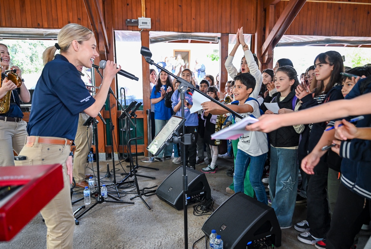 Members of the U.S. Air Forces in Europe and Air Forces Africa Band’s “Touch N’ Go” ensemble perform at the Turkish American Association in Adana, Türkiye, April 6, 2025. The event brought together more than 300 students studying English and American culture, creating opportunities for meaningful cultural exchange and connection. The performance was part of a broader tour supporting the city’s annual Orange Blossom Carnaval. (U.S. Air Force photo by Master Sgt. Siuta Ika)