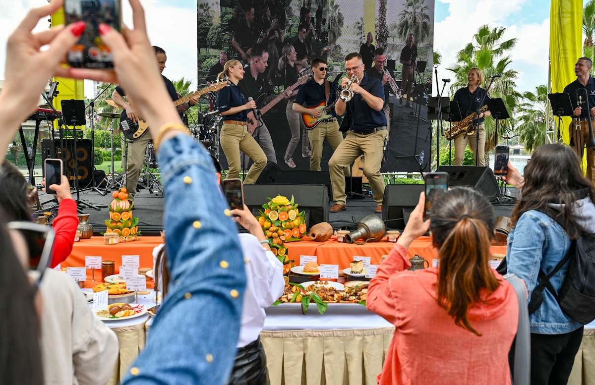 Members of the U.S. Air Forces in Europe and Air Forces Africa Band’s “Touch N’ Go” ensemble perform during the Orange Flavors Show in Adana, Türkiye, April 5, 2025. The performance was part of a weeklong tour in support of the city’s annual Orange Blossom Carnaval, fostering cultural connections between the United States and its NATO Ally. The high-energy show blended American pop and rock with local flavor, drawing an enthusiastic crowd from across the community. (U.S. Air Force photo by Master Sgt. Siuta Ika)