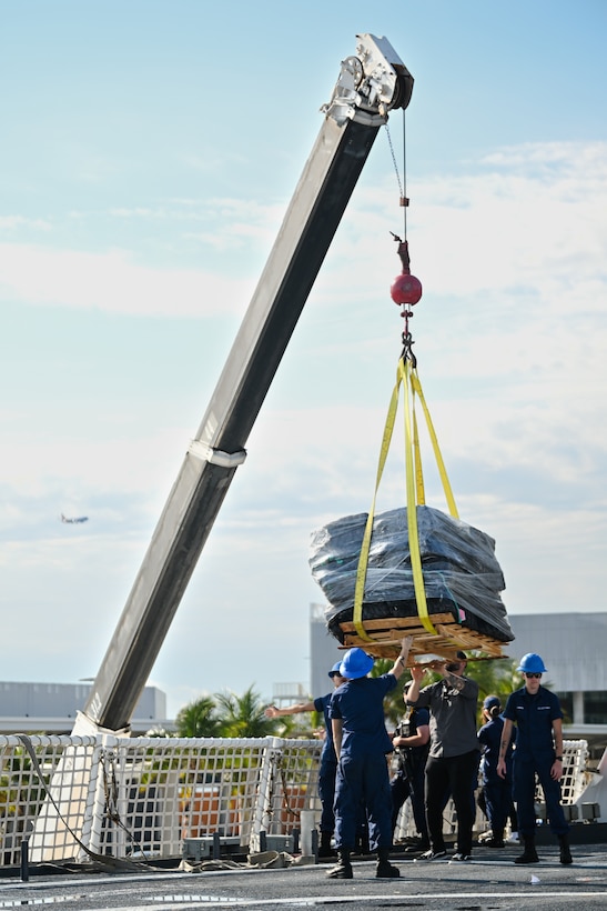 Crewmembers from Coast Guard Cutter James offload bales of interdicted narcotics in Port Everglades, April 9, 2025. James’ crew offloaded more than 44,550 pounds of cocaine and 3,880 pounds of marijuana valued at approximately $509.9 million intercepted in the international waters of the Eastern Pacific Ocean. (Coast Guard photo by Petty Officer 3rd Class Jessica Walker)