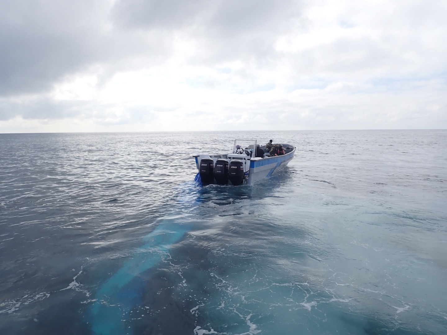 A Coast Guard Cutter James gunner sets fire to a suspected drug smuggling vessel after the suspected smugglers and drugs are on the ship in the Eastern Pacific Ocean, Feb. 1, 2025. The crew of U.S. Coast Guard Cutter James offloaded more than 44,550 pounds of cocaine and 3,880 pounds of marijuana valued at approximately $509.9 million in Port Everglades, April 9, 2025. (U.S. Coast Guard photo)