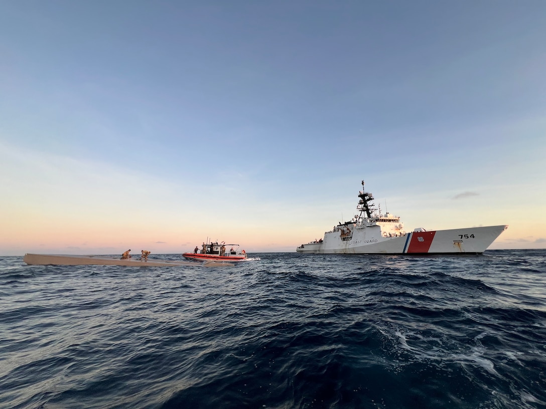 Coast Guard Cutter James law enforcement officers board a low profile vessel in the Eastern Pacific Ocean, Jan. 7, 2025. The crew of U.S. Coast Guard Cutter James offloaded more than 44,550 pounds of cocaine and 3,880 pounds of marijuana valued at approximately $509.9 million in Port Everglades, April 9, 2025. (U.S. Coast Guard photo)
