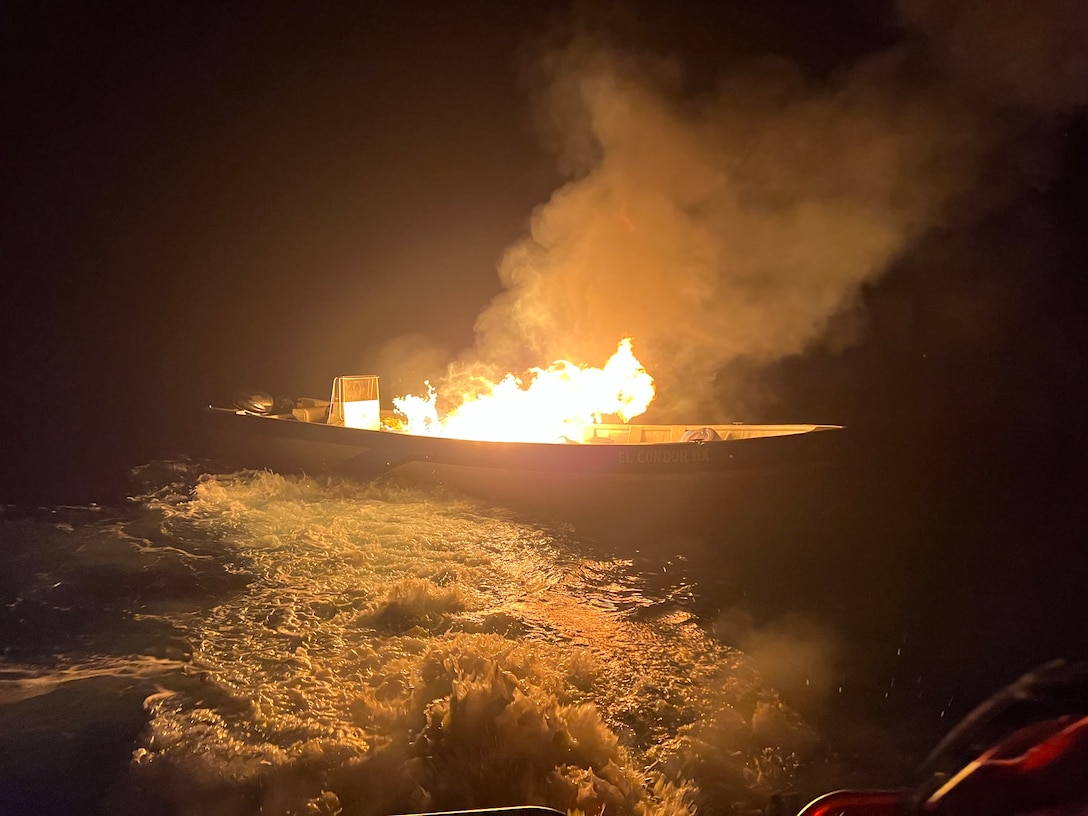 An interdicted drug vessel is set on fire in the Eastern Pacific Ocean, Jan. 6, 2025. The crew of U.S. Coast Guard Cutter James offloaded more than 44,550 pounds of cocaine and 3,880 pounds of marijuana valued at approximately $509.9 million in Port Everglades, April 9, 2025. (U.S. Coast Guard photo)