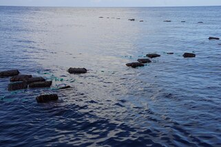 Jettisoned bales of illegal narcotics float in the Eastern Pacific Ocean, Jan. 6, 2025. The crew of U.S. Coast Guard Cutter James offloaded more than 44,550 pounds of cocaine and 3,880 pounds of marijuana valued at approximately $509.9 million in Port Everglades, April 9, 2025. (U.S. Coast Guard photo)