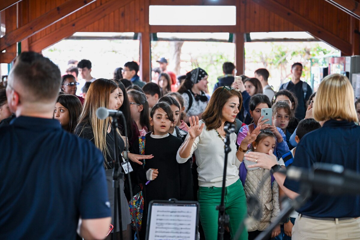 Students and staff dance as the U.S. Air Forces in Europe and Air Forces Africa Band’s “Touch N’ Go” ensemble performs at the Turkish American Association in Adana, Türkiye, April 6, 2025. The lively event brought together more than 300 students studying English and American culture, creating a vibrant atmosphere of cultural exchange through music. The performance was part of a weeklong tour supporting the city’s annual Orange Blossom Carnaval. (U.S. Air Force photo by Master Sgt. Siuta Ika)