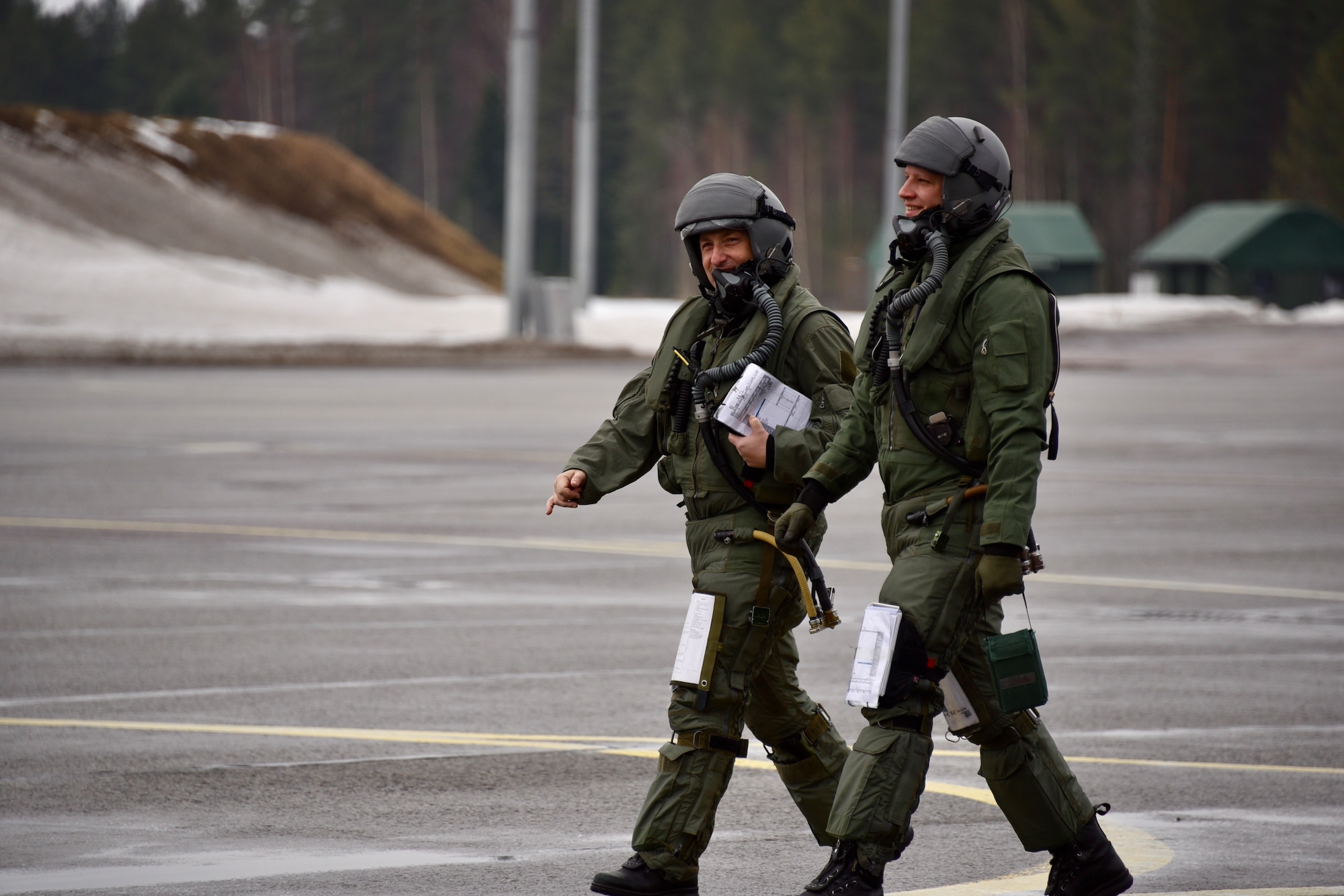 U.S. Air Force Col. Jeffrey Shulman, 80th Flying Training Wing commander, and a Finnish Air Force Academy instructor pilot, step to fly a local training sortie