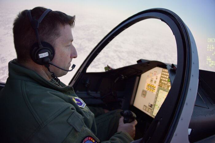U.S. Air Force Col. Jeffrey Shulman, 80th Flying Training Wing commander, flies a simulator at the Finnish Air Force Academy