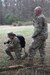 U.S. Army Sgt. Aliyah Vivier, left, and Sgt. Glenn Brennan, public affairs specialists with the 109th Mobile Public Affairs Detachment, 213th Regional Support Group, set up equipment for a field training exercise at Fort Indiantown Gap, Pennsylvania, April 4, 2024. These Soldiers executed the FTX, which included running a media operations center in a combat scenario, to improve the unit's readiness for future missions. (U.S. Army National Guard photo by Spc. Skylin Simpson)