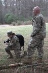 U.S. Army Sgt. Aliyah Vivier, left, and Sgt. Glenn Brennan, public affairs specialists with the 109th Mobile Public Affairs Detachment, 213th Regional Support Group, set up equipment for a field training exercise at Fort Indiantown Gap, Pennsylvania, April 4, 2024. These Soldiers executed the FTX, which included running a media operations center in a combat scenario, to improve the unit's readiness for future missions. (U.S. Army National Guard photo by Spc. Skylin Simpson)