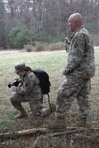U.S. Army Sgt. Aliyah Vivier, left, and Sgt. Glenn Brennan, public affairs specialists with the 109th Mobile Public Affairs Detachment, 213th Regional Support Group, set up equipment for a field training exercise at Fort Indiantown Gap, Pennsylvania, April 4, 2024. These Soldiers executed the FTX, which included running a media operations center in a combat scenario, to improve the unit's readiness for future missions. (U.S. Army National Guard photo by Spc. Skylin Simpson)
