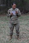U.S. Army Capt. Angela Clemons, a public affairs officer with the 109th Mobile Public Affairs Detachment, 213th Regional Support Group, conducts a briefing during a field training exercise at Fort Indiantown Gap, Pennsylvania, April 4, 2024. These Soldiers executed this training to improve the unit's readiness for future missions. (U.S. Army National Guard photo by Spc. Skylin Simpson)