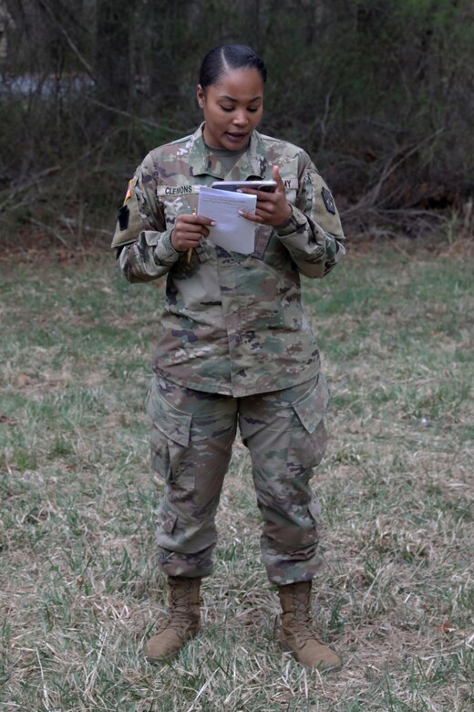 U.S. Army Capt. Angela Clemons, a public affairs officer with the 109th Mobile Public Affairs Detachment, 213th Regional Support Group, conducts a briefing during a field training exercise at Fort Indiantown Gap, Pennsylvania, April 4, 2024. These Soldiers executed this training to improve the unit's readiness for future missions. (U.S. Army National Guard photo by Spc. Skylin Simpson)