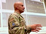 Maj. David Amiel discusses the science and military utility of satellite technology during a bilateral forum at the Indian Navy’s Maritime Warfare Center during Tiger Triumph 2025.