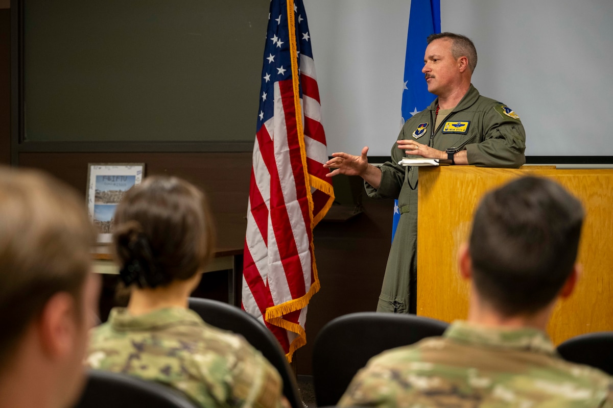 U.S. Air Force Col. Samuel Stitt, 54th Fighter Group commander, gives a speech during the first 54th Operations Support Squadron’s F-16 Fighting Falcon Intelligence Formal Training Unit graduation at Holloman Air Force Base, New Mexico, April 3, 2025.