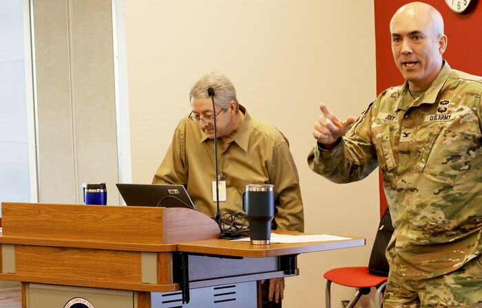 A Soldier speaking to an audience.