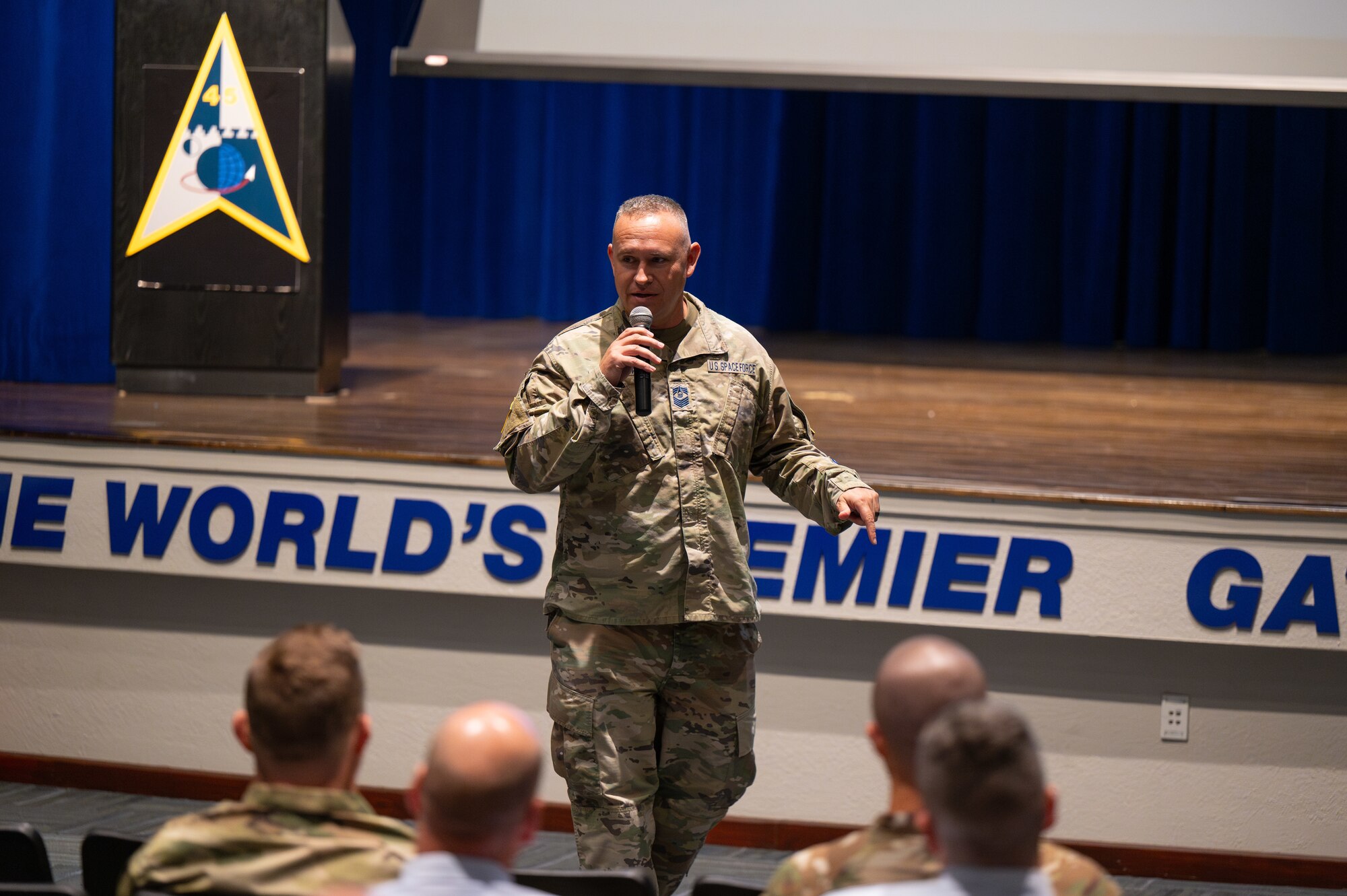 U.S. Space Force and U.S. Air Force Senior Non-Commissioned Officers from across Space Systems Command are welcomed to the inaugural Leadership XChange by Chief Master Sgt Apodaca, host of the inaugural event at Patrick Space Force Base, Fla., on March 24, 2025. The engagement focused on empowering SNCOs to effectively advocate for resources and navigate complex joint environments, ultimately driving mission success through collaborative problem-solving and enhanced leadership capabilities.  (U.S. Space Force photo by Amanda Inman)