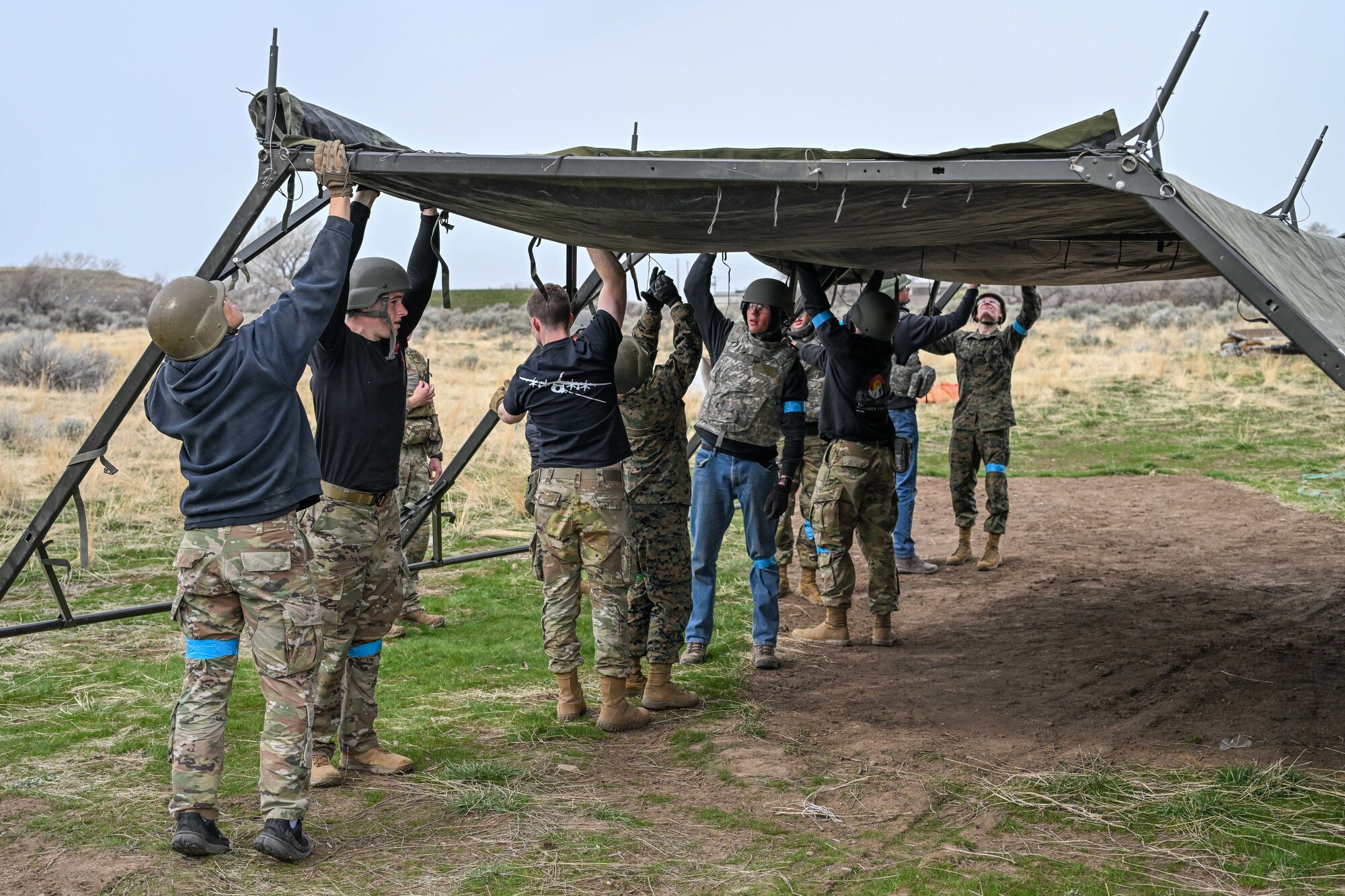 ROTC students build a tented structure
